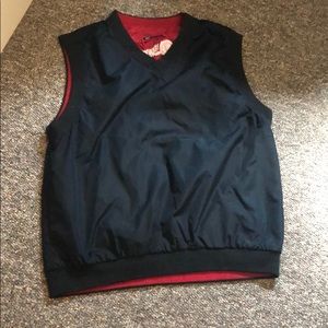 Used men’s  raining vest by wedge size M